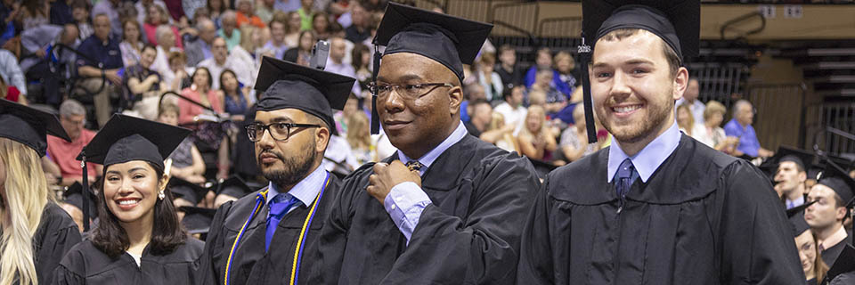 Rockhurst University students at commencement Andrews McMeel Award honors students pursuing diversity, equity and inclusion efforts