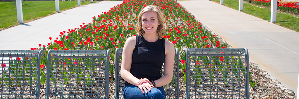 Annika Svoboda, '18 Annika Svoboda sits in front of some tulips on campus