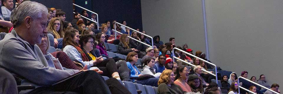 Arrupe Hall audience enjoying a show Arrupe Hall hosting a Midwest Poet Series speaer