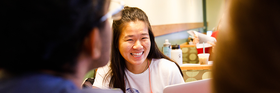 Students chatting in a coffee shop