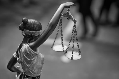 Justice is Blind Lady Justice blindfolded and holding scales