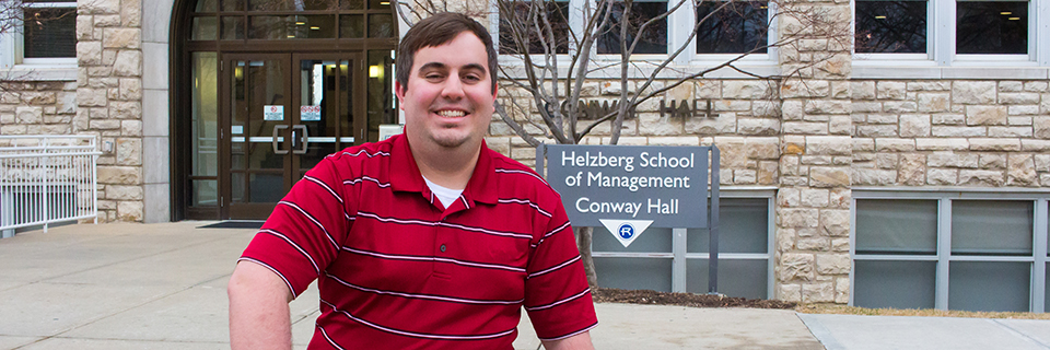 Kevin Burjarski, '20 MS-BIA Kevin Burjarski sits on a bench outside of Conway hall