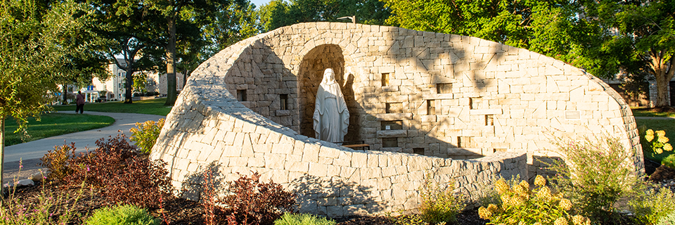 Statue of Mary grotto on the campus of Rockhurst University