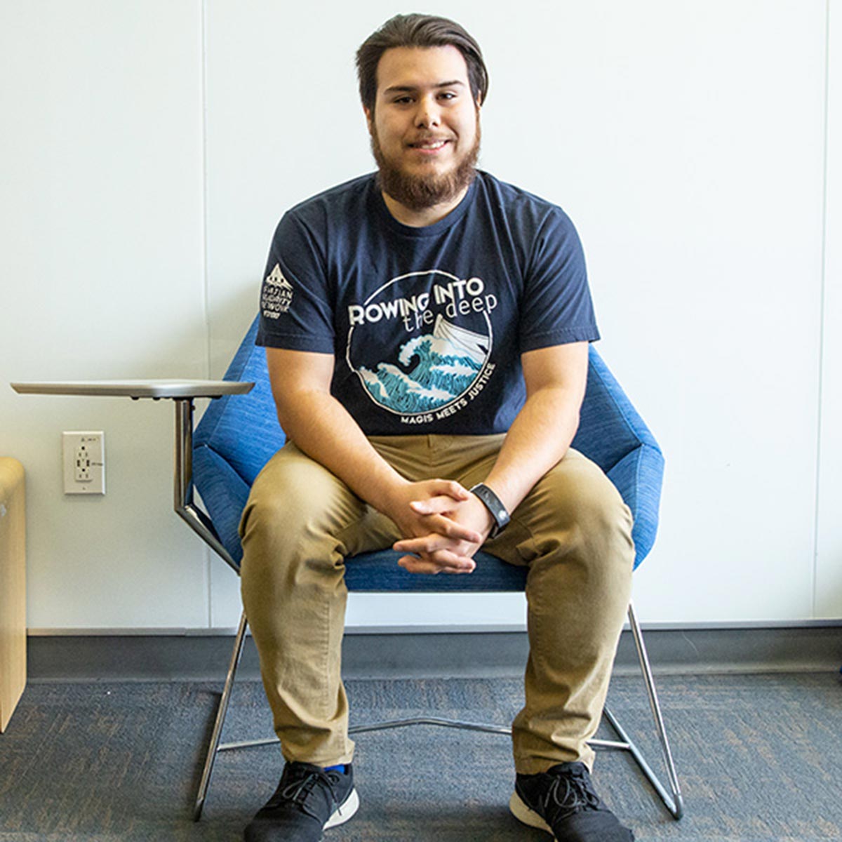 Alexis Medina poses for a picture in Arrupe Hall.