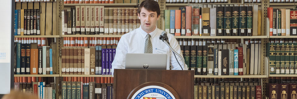 A Nonprofit Leadership students presents at the annual Nonprofit Leadership Award Luncheon