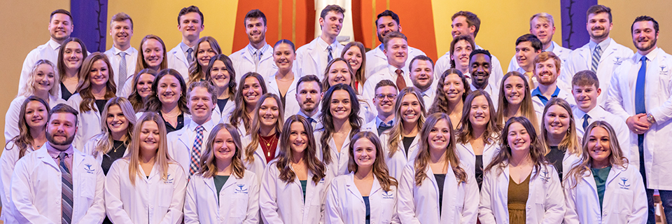Group shot of Doctor of Physical Therapy students after whitecoat ceremony