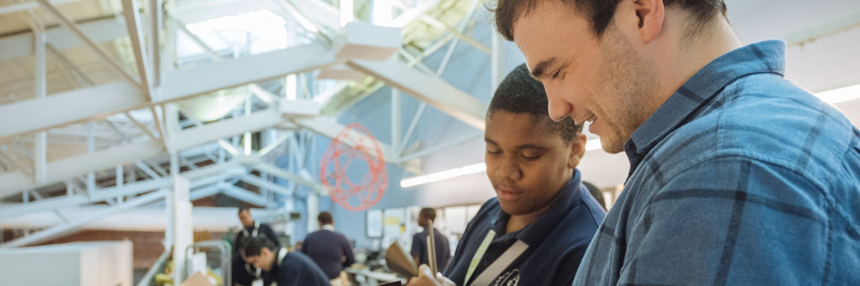Secondar Education A Secondary Education student works with a high schooler at STEAM Studio KC