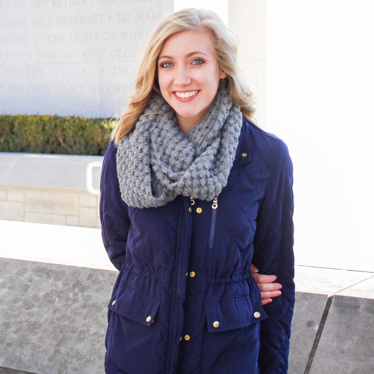 Annika Svoboda stands near the bell tower. 