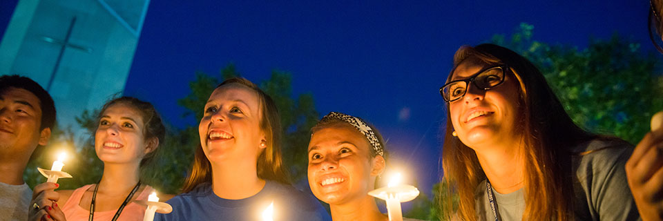 Freshman Admission Students with candles