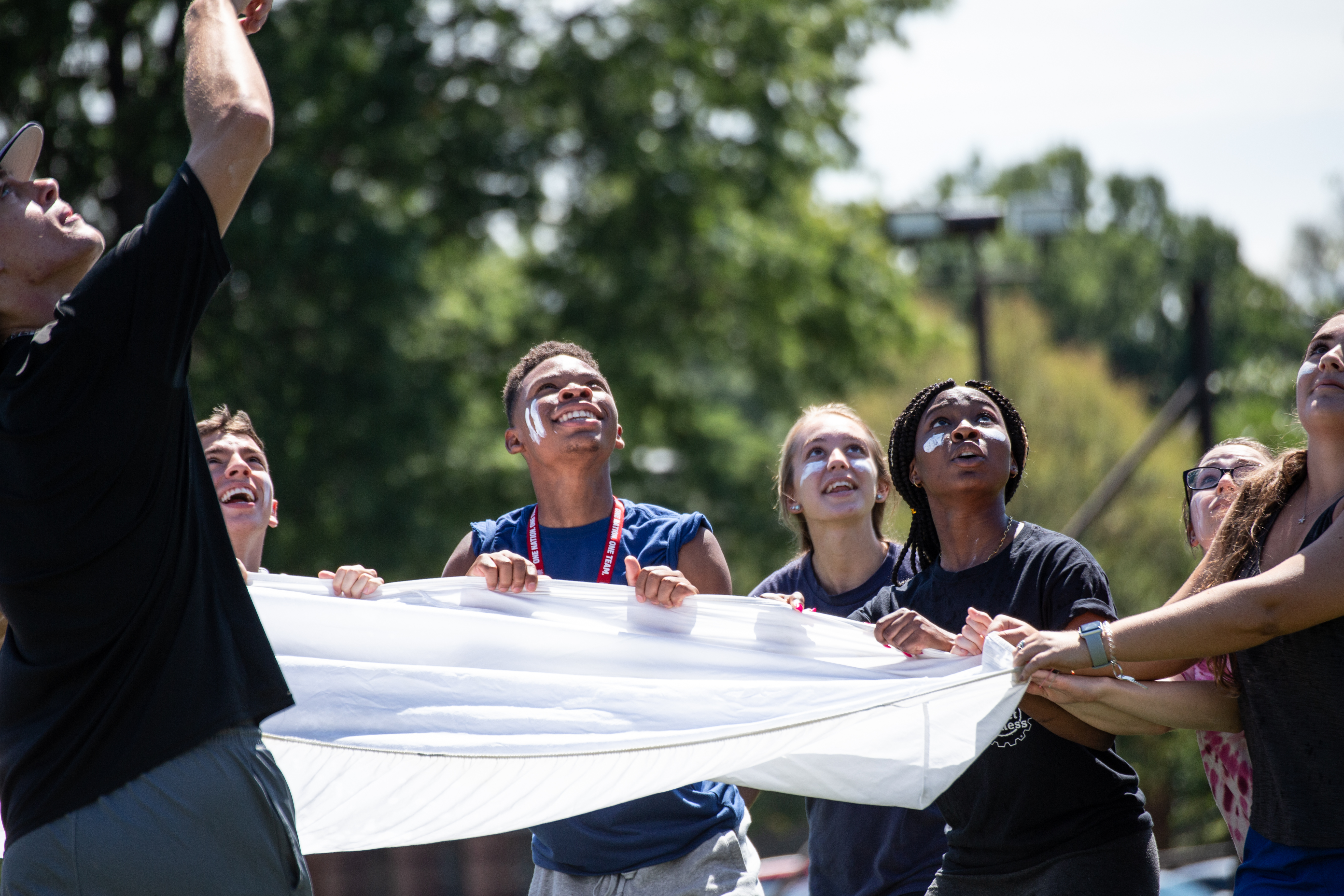 Orientation Olympics Students Catch a Water Balloon in Orientation Olympics