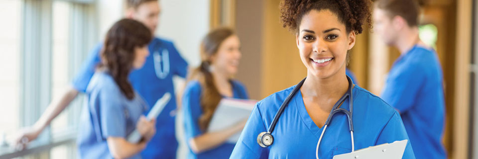 Associate of Science in Allied Health Student smiling with stethoscope