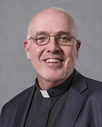 Rev. James N. Caime, S.J.