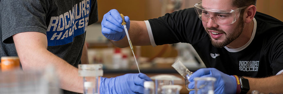 Students conducting chemistry experiment