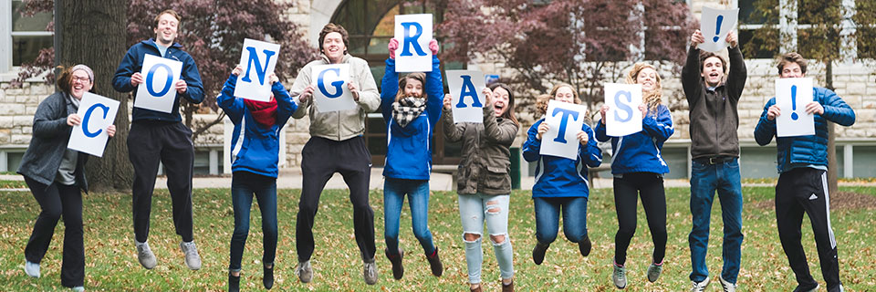 Admitted Students Day Students jumping, spell out Congrats!!