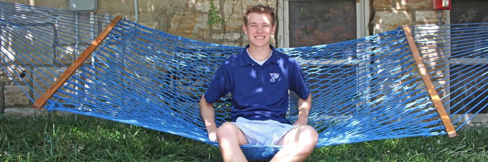Connor Larson, '20 Connor Larson sits in a hammock