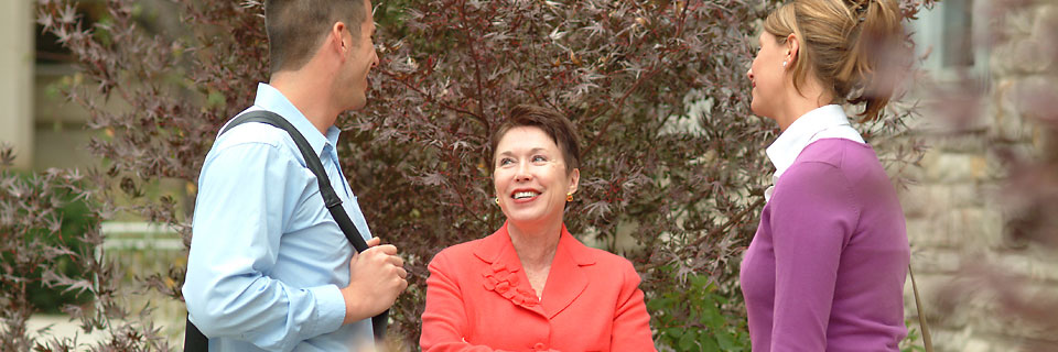 Employer Services Employer talking with students