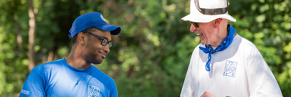 Student talking to Rockhurst President