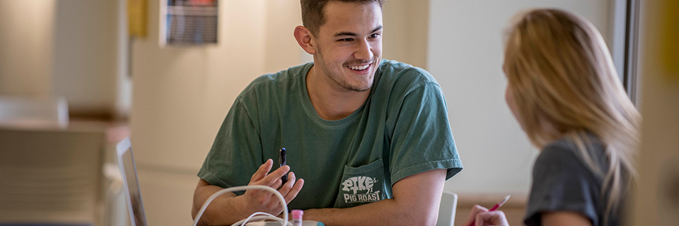 Film Studies minor Students work together in the science center.
