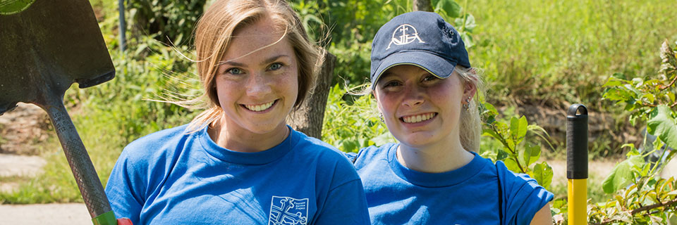 Students smiling at service project