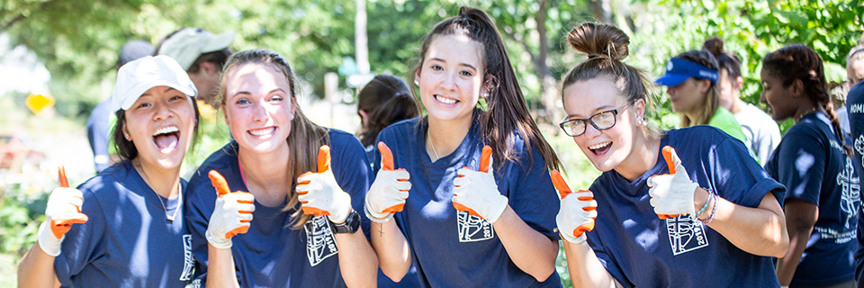 4 students participating in the Finucane service project Students participating in the Finucane service project