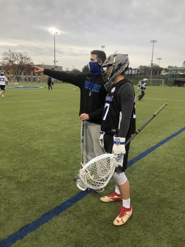 Coaching Internship Intern, Patrick Fitsimmons, on the field