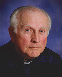 Rev. James J. White, S.J.
