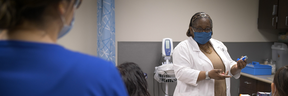 Donna Gardner teaches during a class for medical assistant students