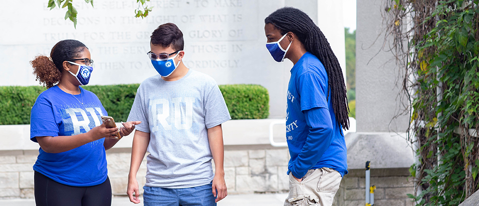 Make a Gift Students talking with masks