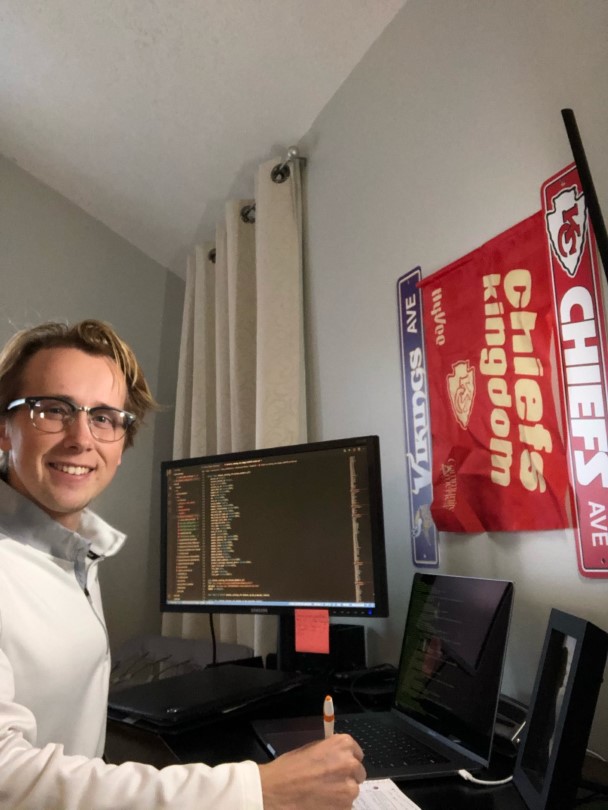 Intern, Brooks Hanson, working at his desk from home