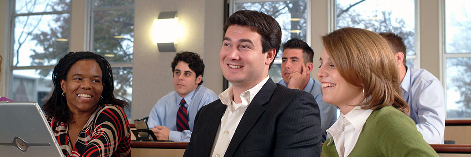 Helzberg EMBA versus MBA Graduate students talking