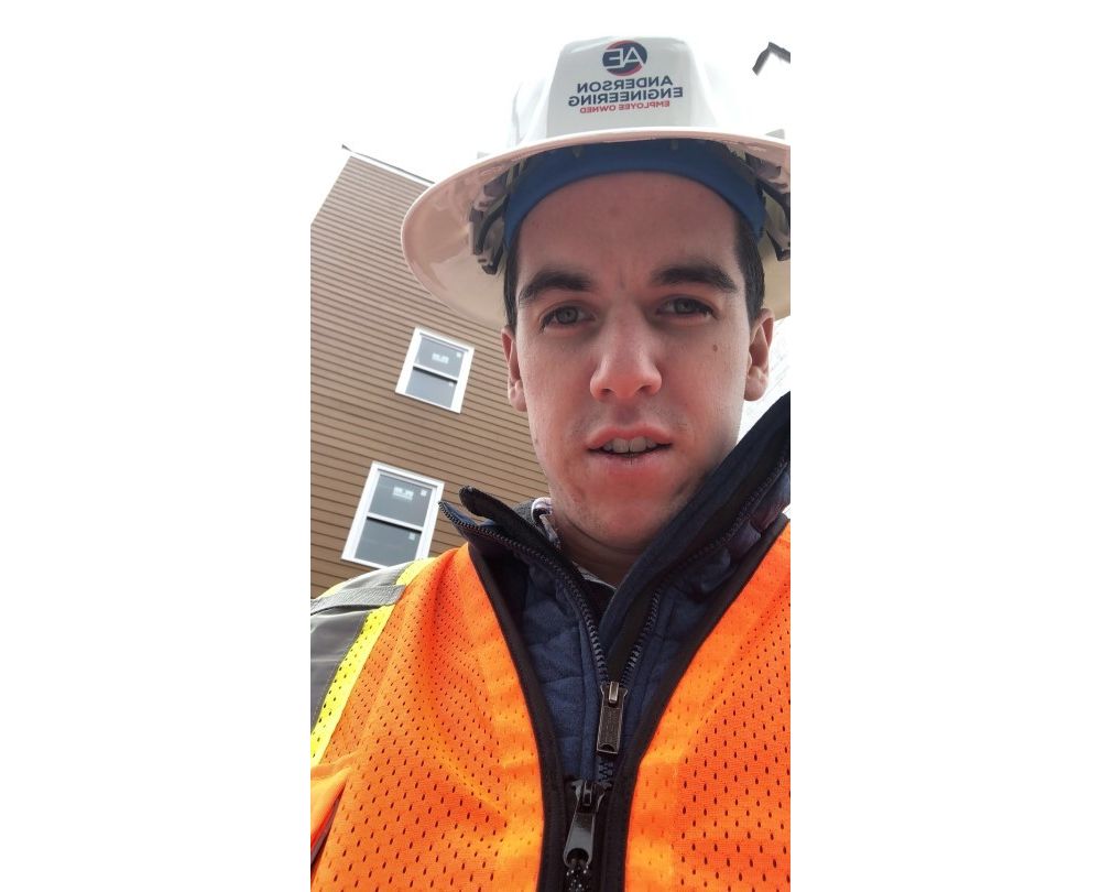 Engineering Intern on the job site Intern, Joe Buchheit, in the field