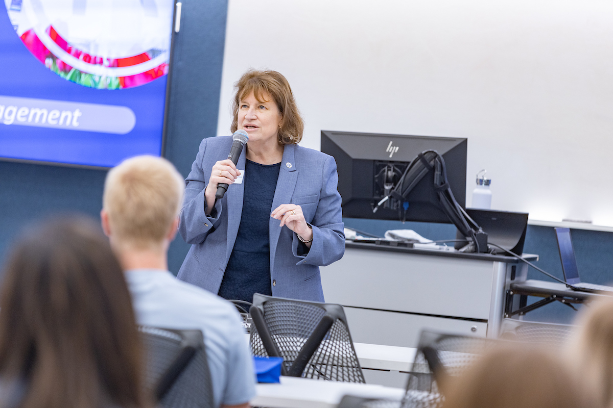 RU President Sandy Cassady speaking to an audience