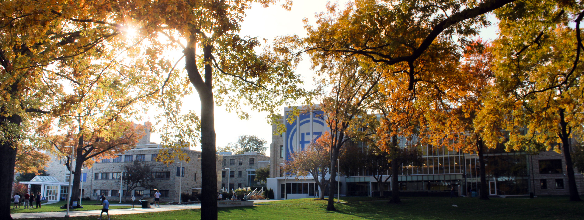 Sedgwick Hall viewed through fall leaves on the Quad at Rockhurst University.