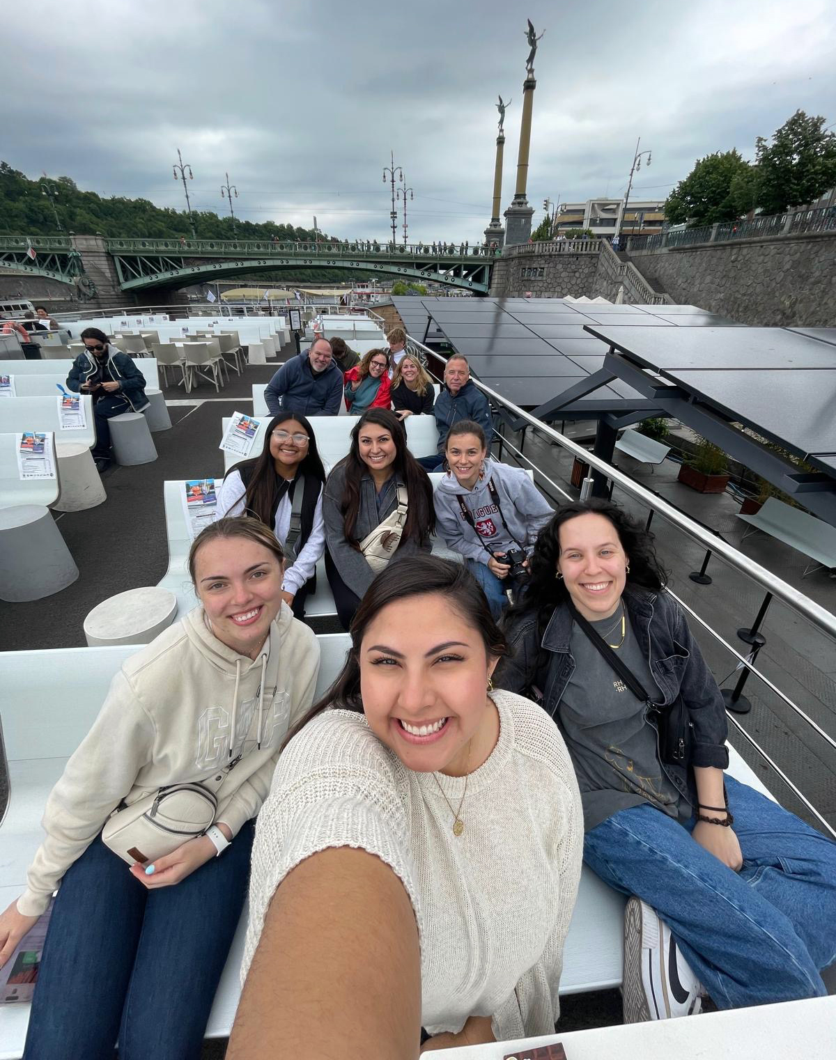 Study abroad students in Prague taking a selfie on a boat