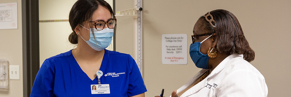 Certificate in Medical Assisting Medical Assisting student speaking with faculty