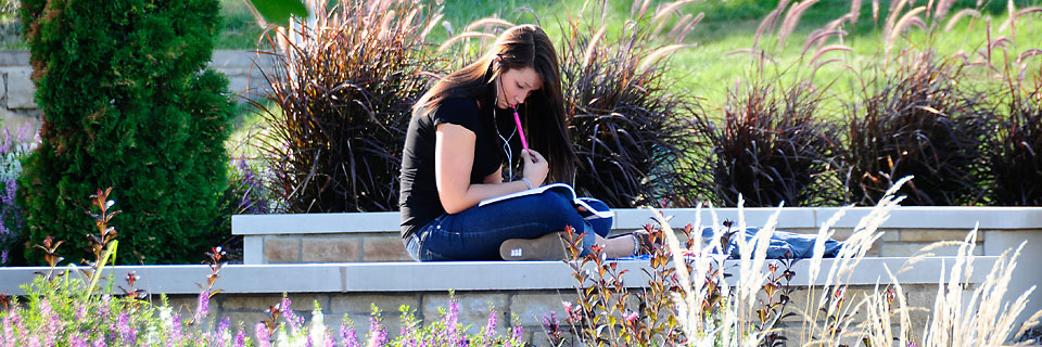 Nonprofit Leadership Studies Student studying outside