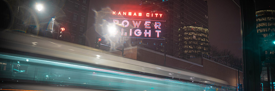 Lightcar passing by the Power and Light District in Kansas City Power and Light District in Kansas City