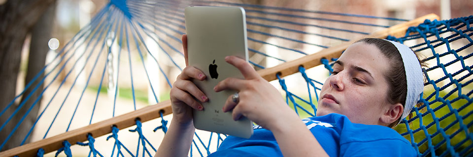 Student Relaxing Student Reading iPad
