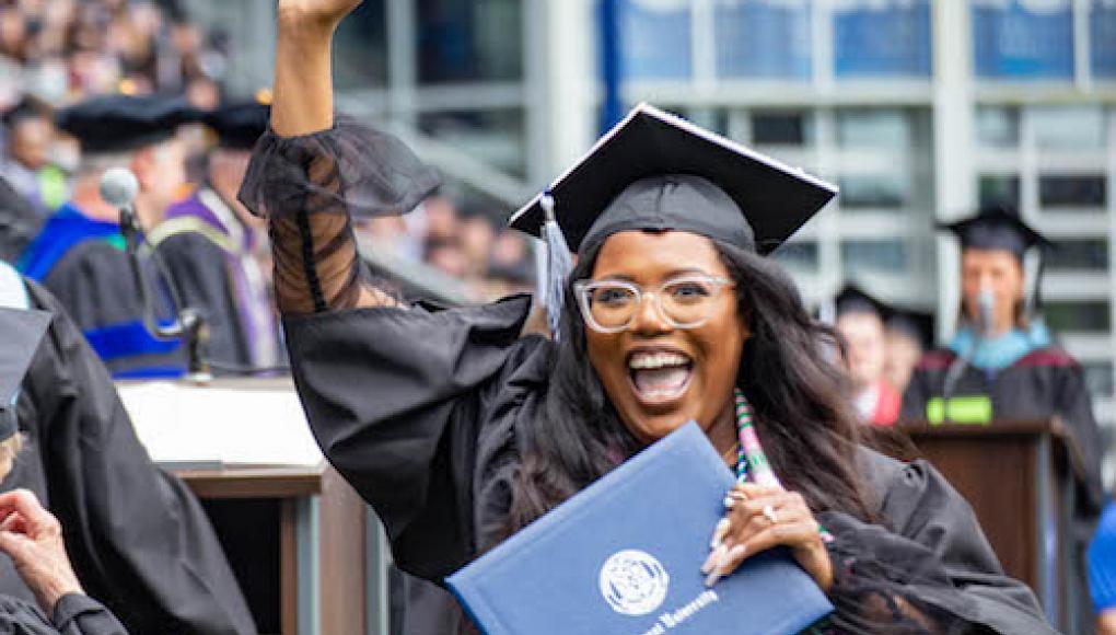 Student waves following commencement