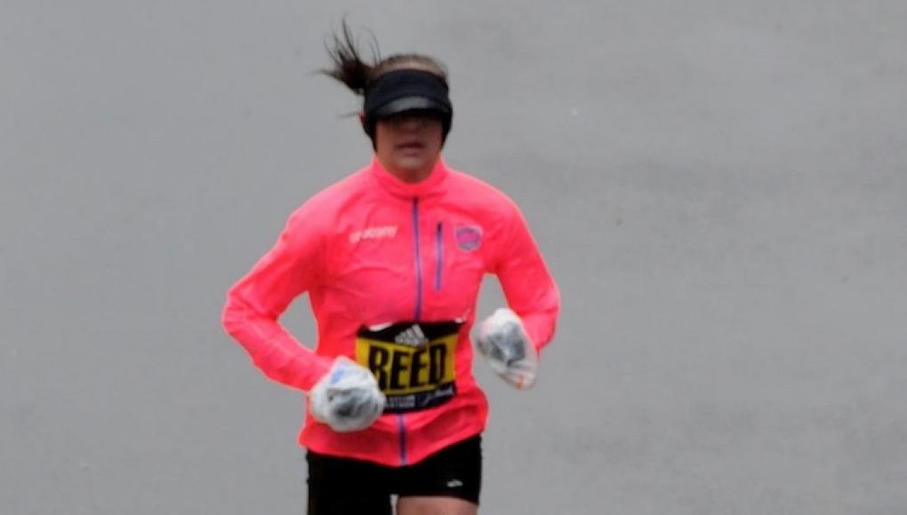 Kimi Reed crosses the finish line at the Boston Marathon