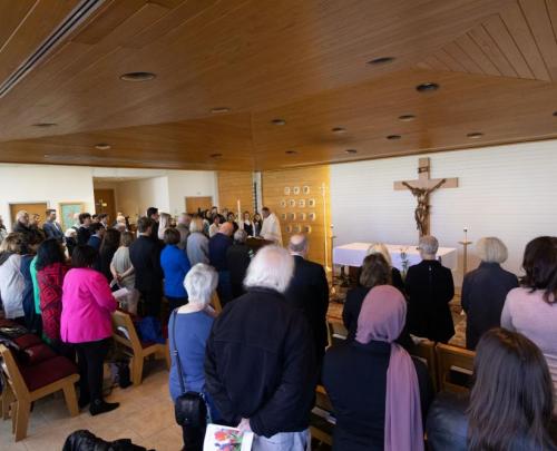 Mabee Chapel on campus with guests celebrating mass