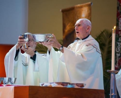 Father Curran Celebrating Mass at St. Francis Xavier Parish