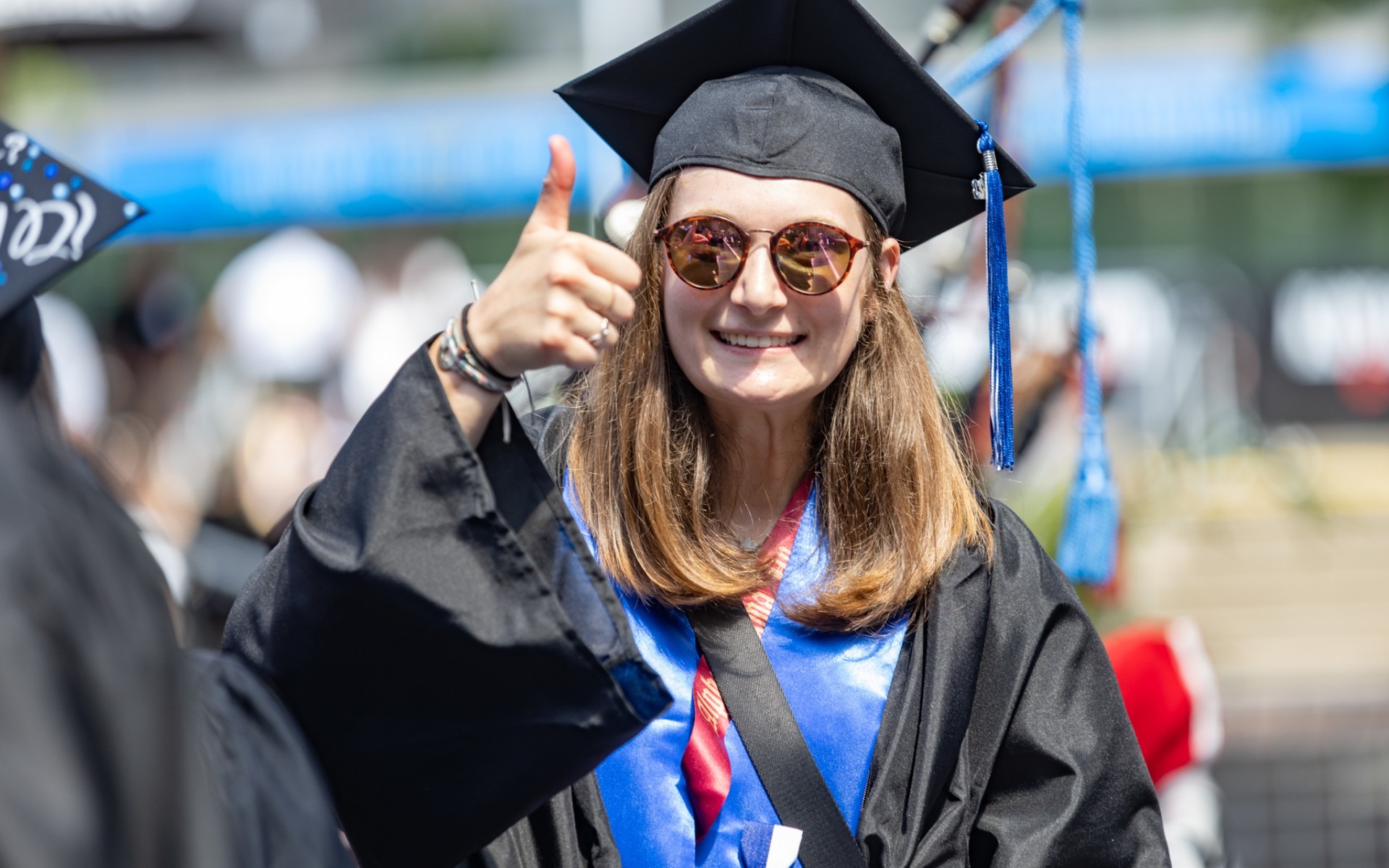 A Rockhurst grad gives the camera a thumbs up