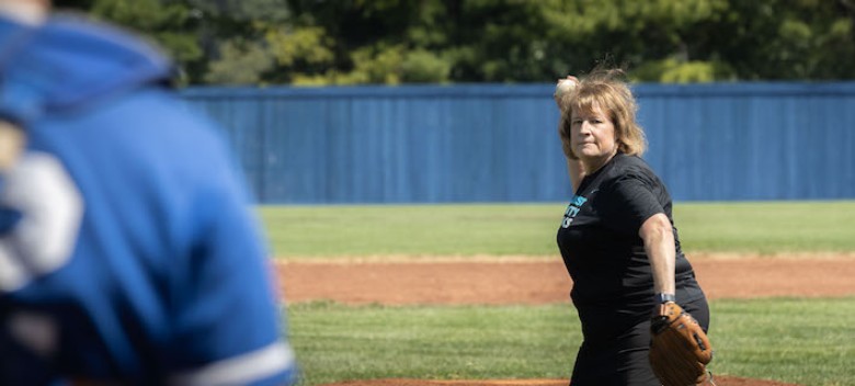 RU President Prepares for Royals First Pitch — With Help from Some Hawks