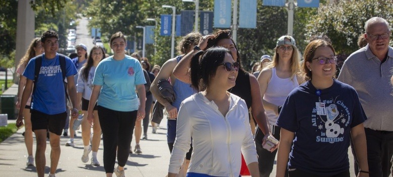 Students, faculty and staff walk on campus to celebrate Exercise is Medicine Month