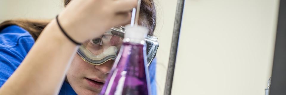 Student studying in a chemistry lab