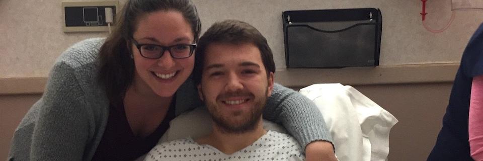Luke Beckett, '15, and his wife in the hospital