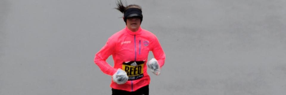 Kimi Reed crosses the finish line at the Boston Marathon