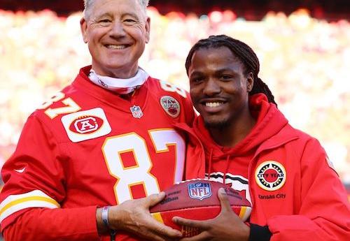 Alumnus on the field honored during a Chiefs game