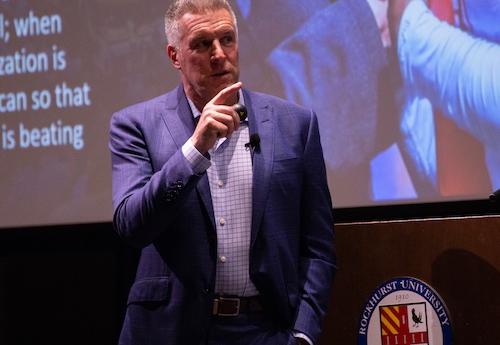 Peter Vermes speaks at a Young Alumni Council event